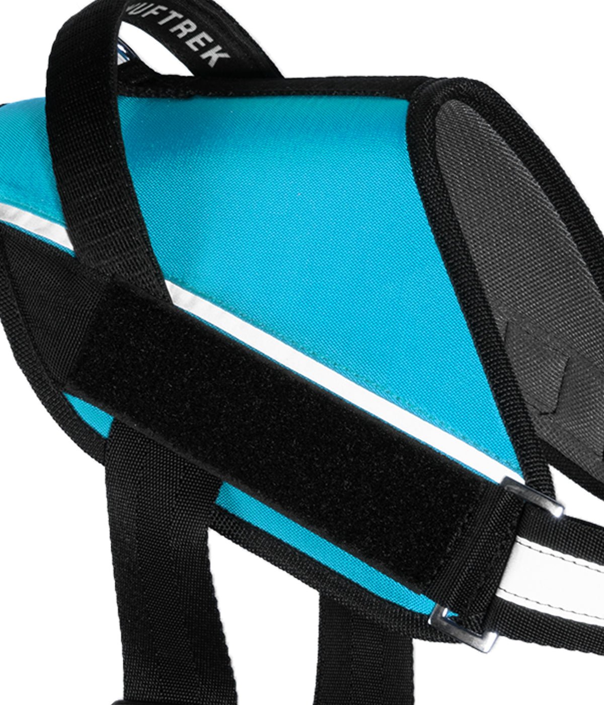 Detalle del velcro lateral del arnés para perros UrbanTrek para colocar parche personalizado