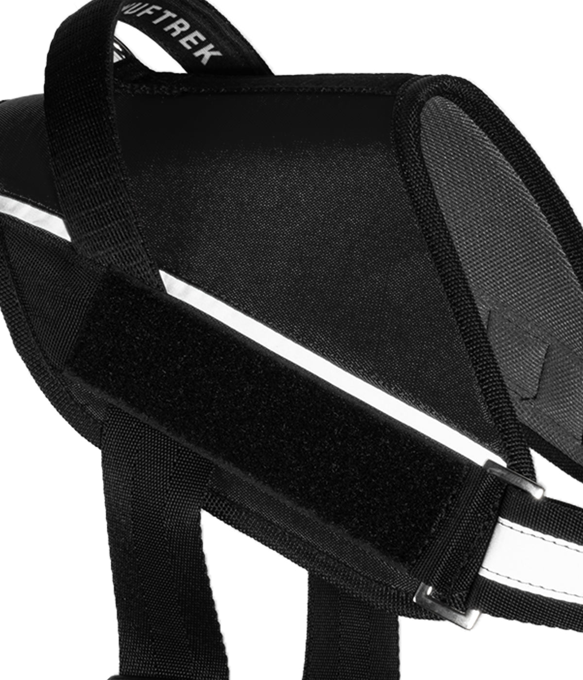 Detalle del velcro lateral del arnés para perros UrbanTrek para colocar parche personalizado