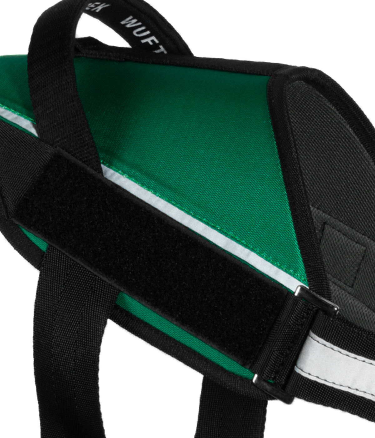 Detalle del velcro lateral del arnés para perros UrbanTrek para colocar parche personalizado