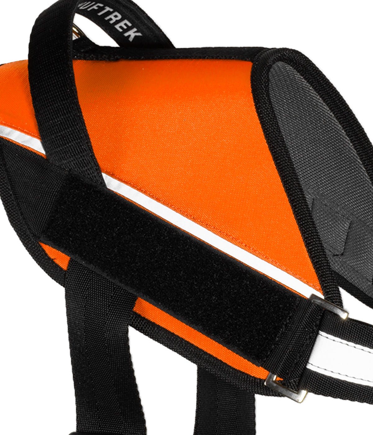 Detalle del velcro lateral del arnés para perros UrbanTrek para colocar parche personalizado