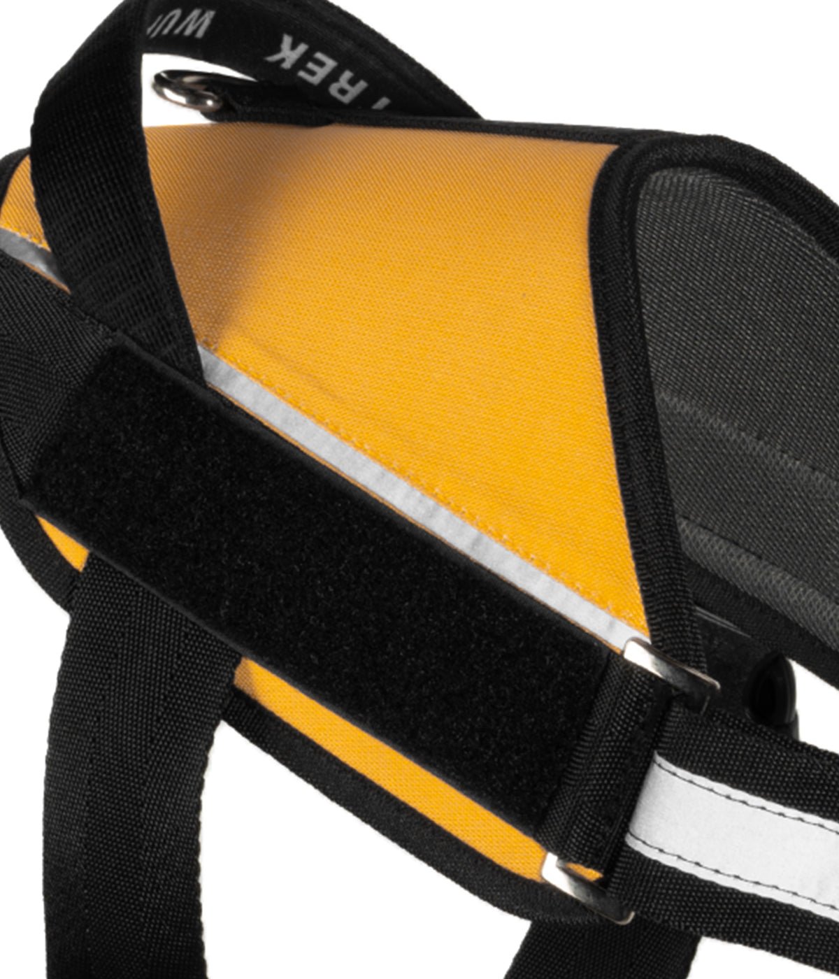 Detalle del velcro lateral del arnés para perros UrbanTrek para colocar parche personalizado