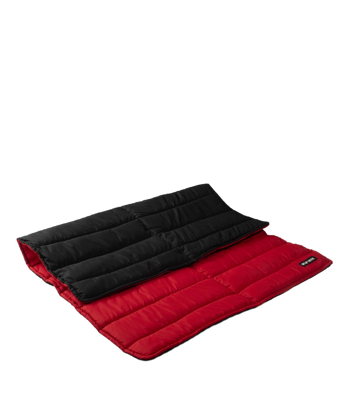 Una cama para perros medio enrollada en color rojo