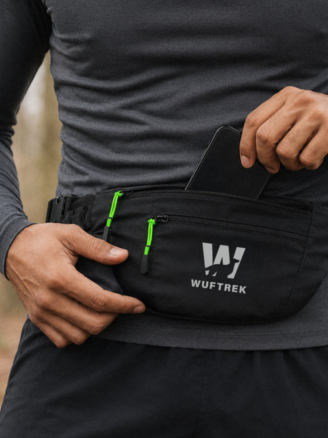 Woman in workout clothes wearing a black canicross belt