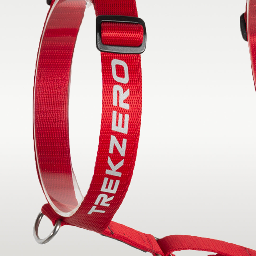 Logo reflectivo del arnés TrekZero H-Series para perros