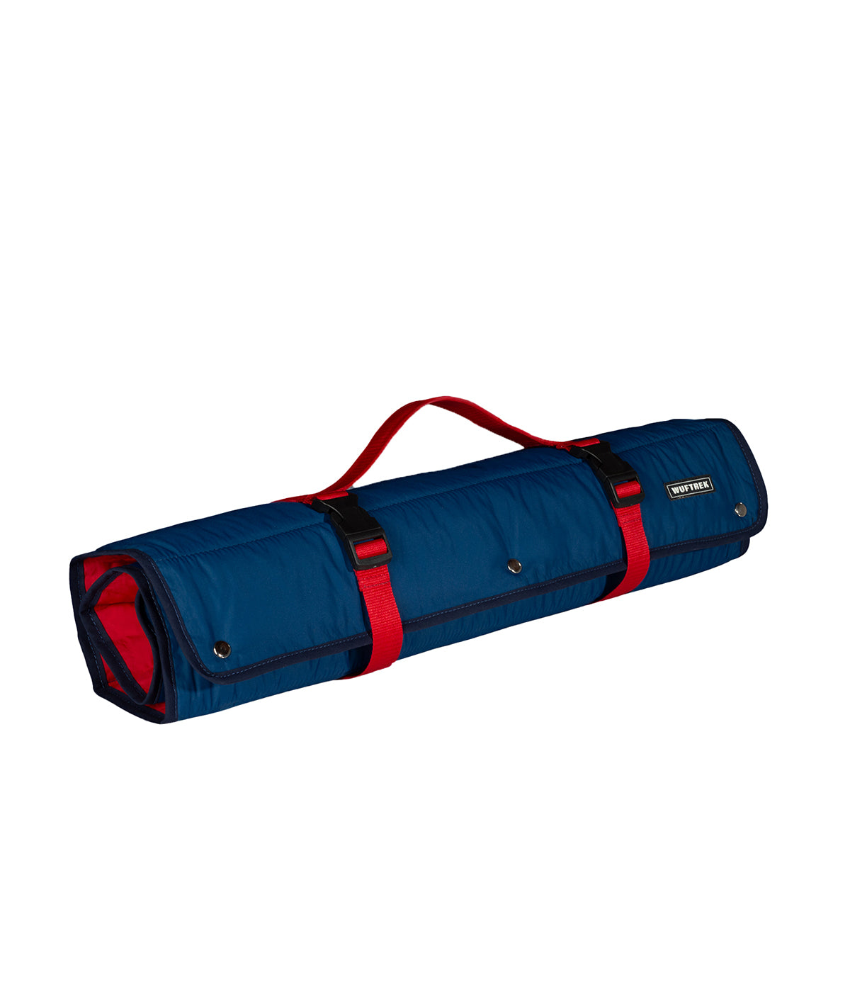 Cama de viaje para perros enrollada color azul y rojo