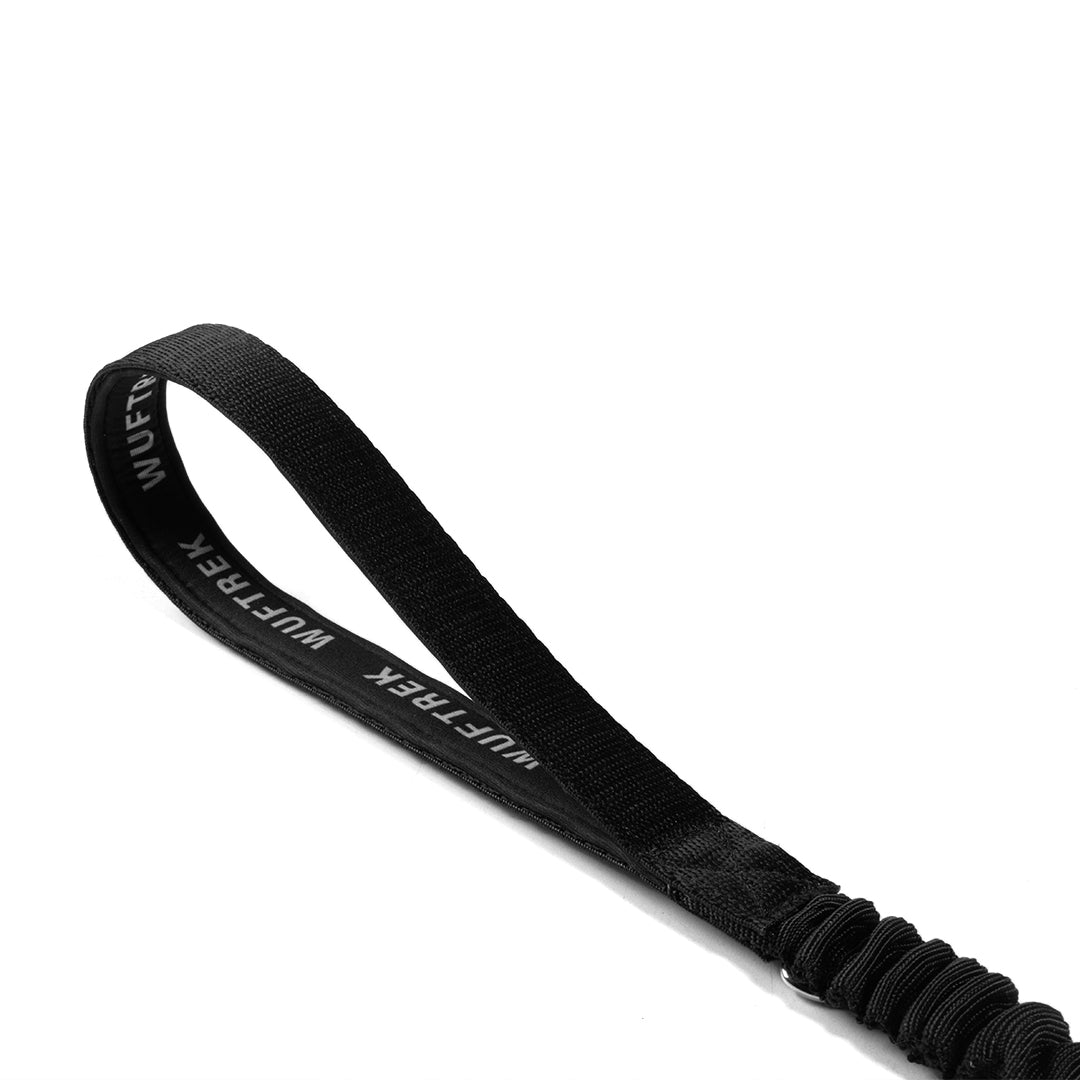 Neoprene-lined handle detail on the black TrekHold shock-absorbing leash extension