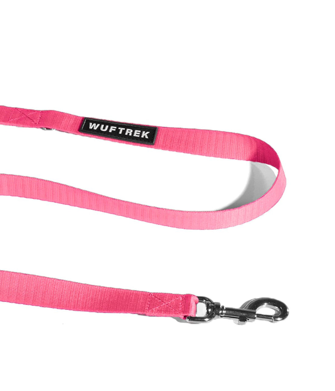 Detalle de una correa para perros color rosa flamingo