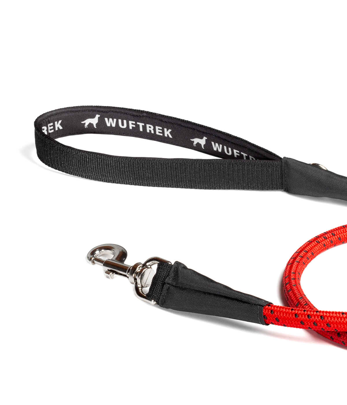 Hardware and neoprene-lined handle detail on the red TrekCord dog leash