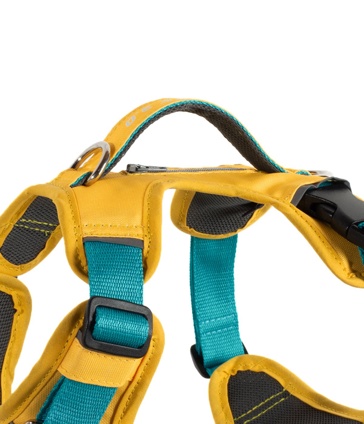 Detalle del bolsillo y la manija de la pechera para perros AirTrek color amarillo y turquesa