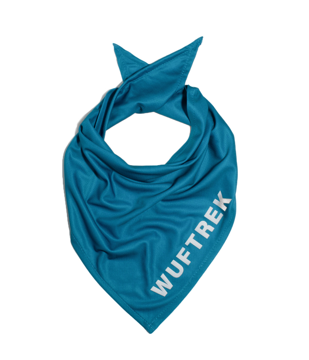 Turquoise fabric dog bandana with WUFTREK branding on one edge